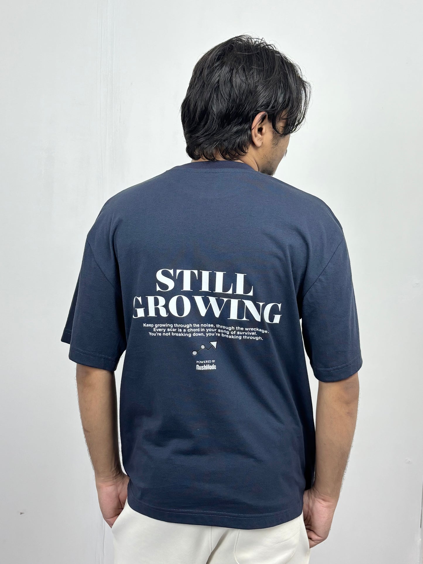 “Still Growing” Navy blue Oversized T-shirt