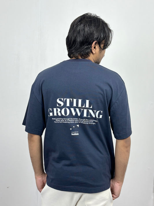 “Still Growing” Navy blue Oversized T-shirt