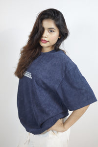 “ Grind Beyond Limits” Navy Blue Oversized Acid Wash T-shirt